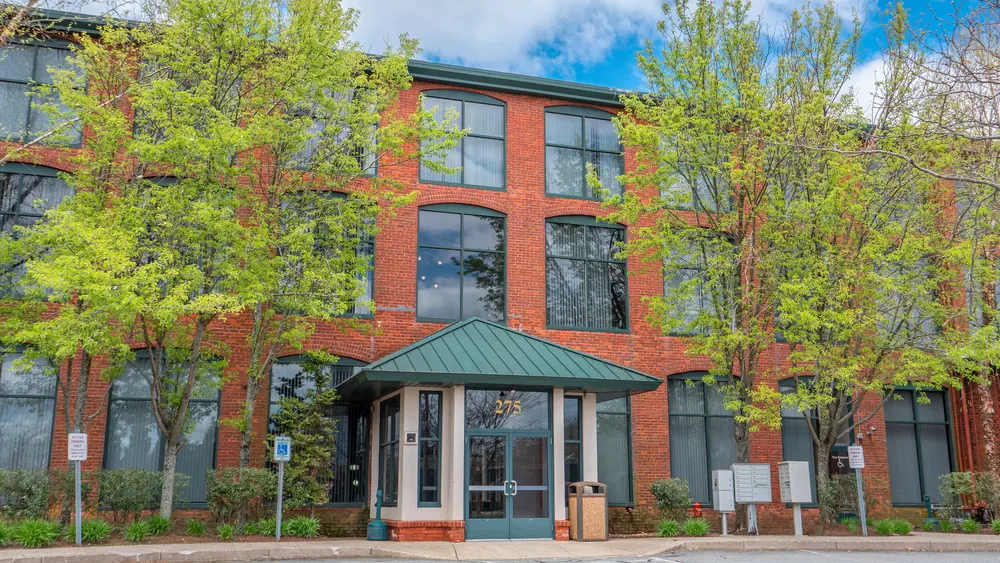 Restored brick mill building converted to offices in Fall River, MA